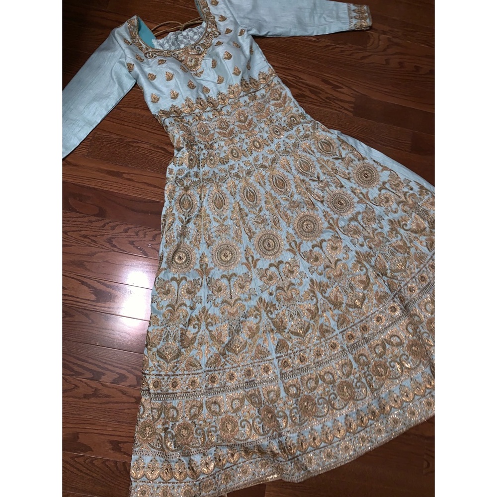 Light blue anarkali/dress with gold embroidery
